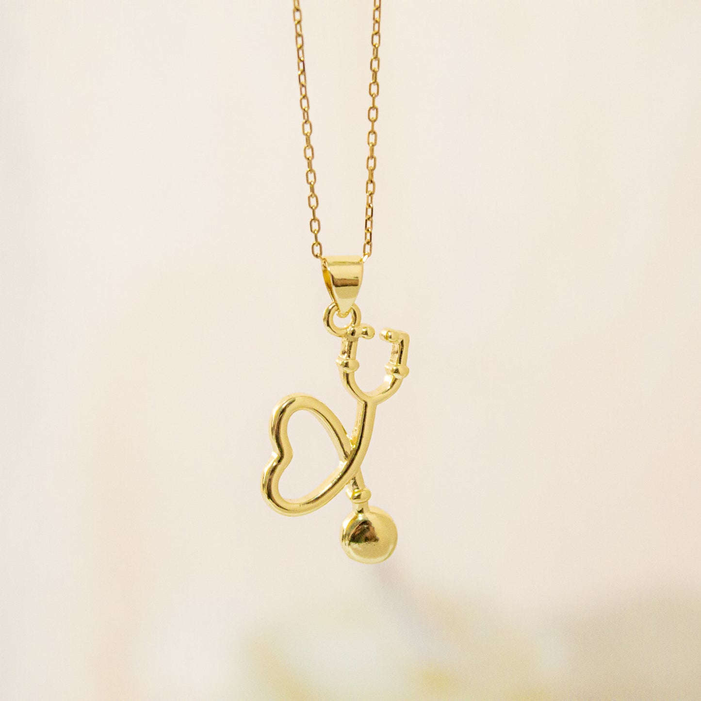 Cadena Estetoscopio Médico Gold