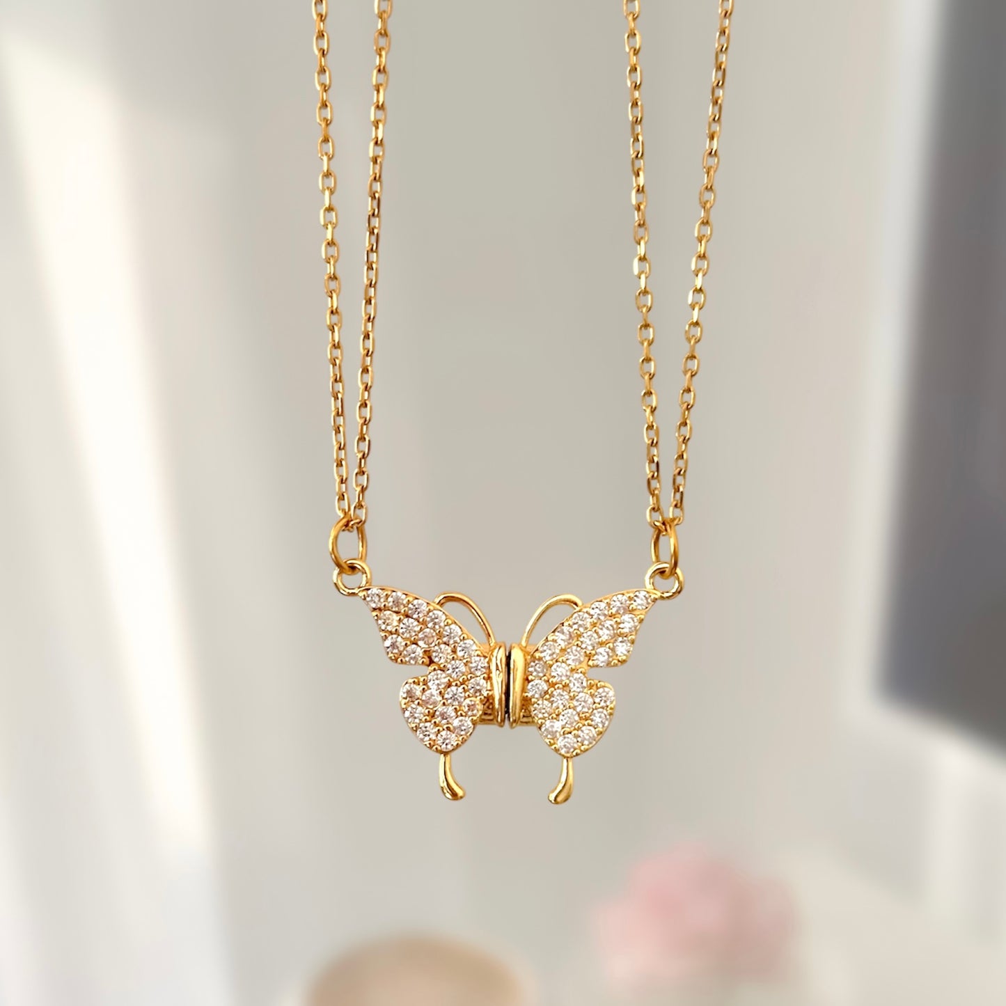 Par de cadenas mariposa imantadas
