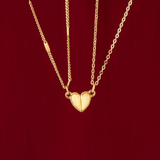 Par de cadenas de corazón imantado